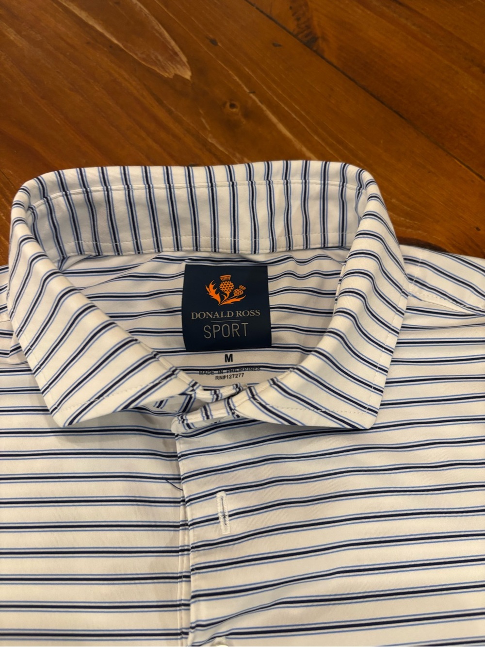 Donald Ross Sport White & Navy Striped Polo with logo from Atlanta National Golf